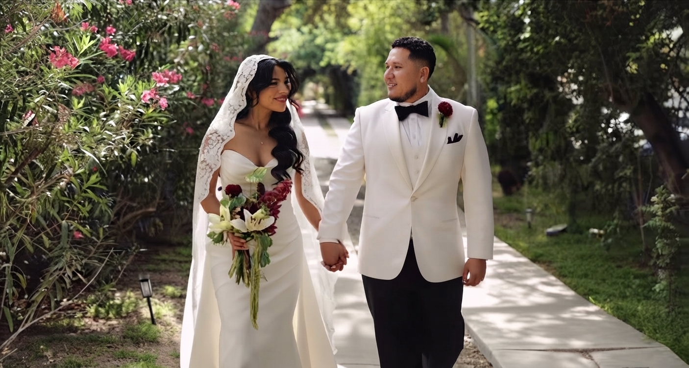 Wedding couple walking together with bouquet